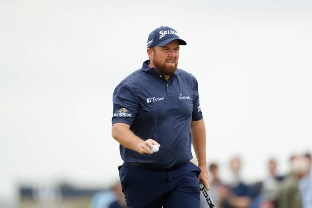 Shane Lowry of Ireland acknowledges the fans on the ninth hole during Day One of The 149th Open at Royal St George’s Golf Club on July 15, 2021 in...