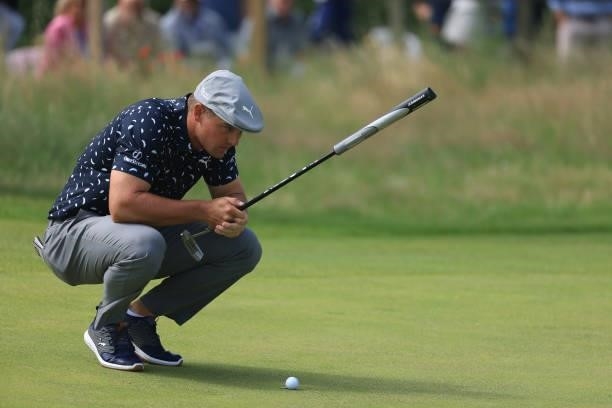 Bryson Dechambeau of The United States lines up a putt on the 4th green during Day One of The 149th Open at Royal St George’s Golf Club on July 15,...