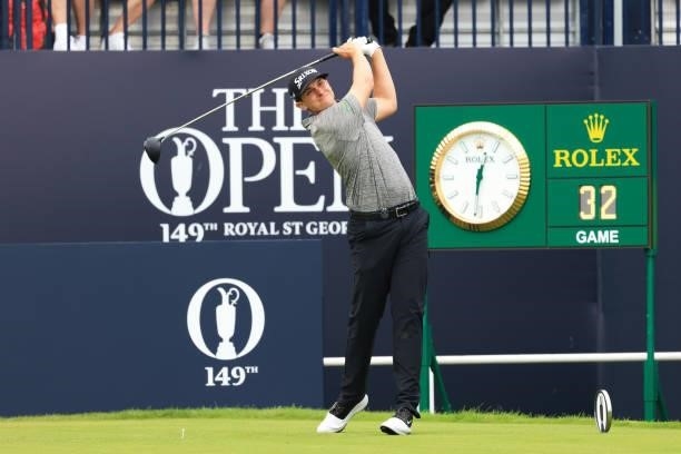 John Catlin of the United States plays his shot from the first tee during Day One of The 149th Open at Royal St George’s Golf Club on July 15, 2021...