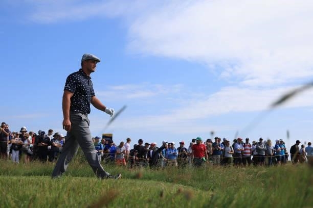 Bryson Dechambeau of The United States walks off 4th tee during Day One of The 149th Open at Royal St George’s Golf Club on July 15, 2021 in...