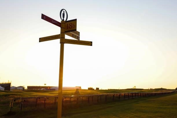 Signpost is pictured as the sun rises ahead of Day One of The 149th Open at Royal St George’s Golf Club on July 15, 2021 in Sandwich, England.
