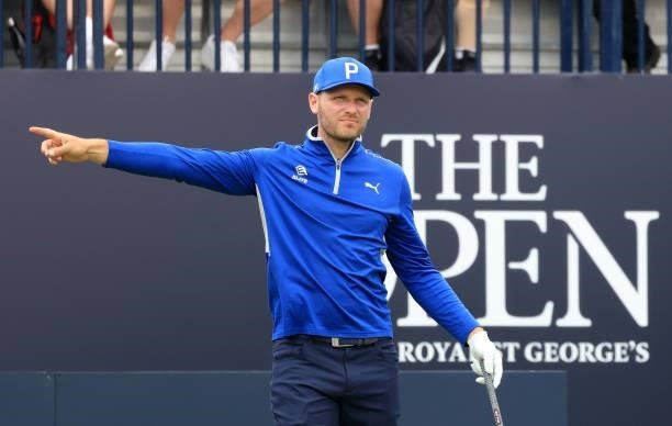 Sam Forgan of England reacts after playing his shot from the first tee during Day One of The 149th Open at Royal St George’s Golf Club on July 15,...