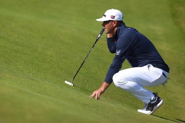 Gary Woodland of The United States lines up a putt on the 2nd green during Day One of The 149th Open at Royal St George’s Golf Club on July 15, 2021...