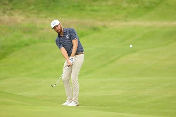 Chris Kirk of the United States plays his third shot on the 18th hole during Day One of The 149th Open at Royal St George’s Golf Club on July 15,...