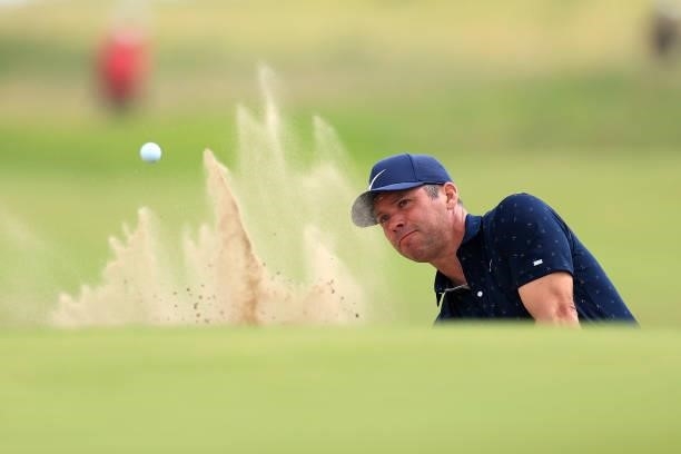 Paul Casey of England plays his third shot on the 14th hole during Day One of The 149th Open at Royal St George’s Golf Club on July 15, 2021 in...