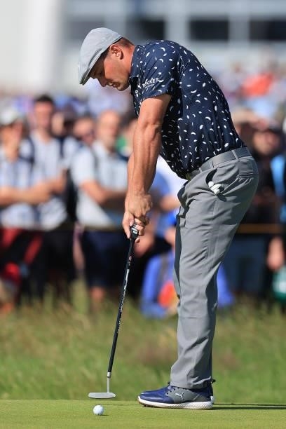 Bryson Dechambeau of The United States putts during Day One of The 149th Open at Royal St George’s Golf Club on July 15, 2021 in Sandwich, England.
