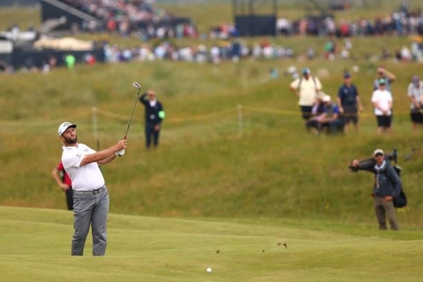 Jon Rahm of Spain plays his second shot on the 10th hole during Day One of The 149th Open at Royal St George’s Golf Club on July 15, 2021 in...