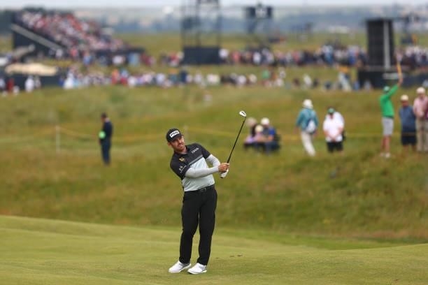 Louis Oosthuizen of South Africa plays his second shot on the 10th hole during Day One of The 149th Open at Royal St George’s Golf Club on July 15,...