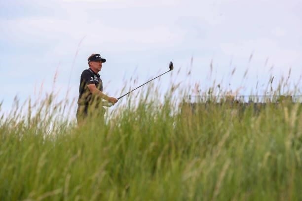 Ian Poulter of England plays a shot on the 18th hole during Day One of The 149th Open at Royal St George’s Golf Club on July 15, 2021 in Sandwich,...