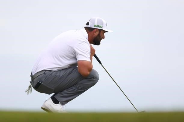 Jon Rahm of Spain lines up a putt on the 10th green during Day One of The 149th Open at Royal St George’s Golf Club on July 15, 2021 in Sandwich,...