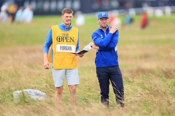 Sam Forgan of England and caddie look ahead on the 2nd hole during Day One of The 149th Open at Royal St George’s Golf Club on July 15, 2021 in...
