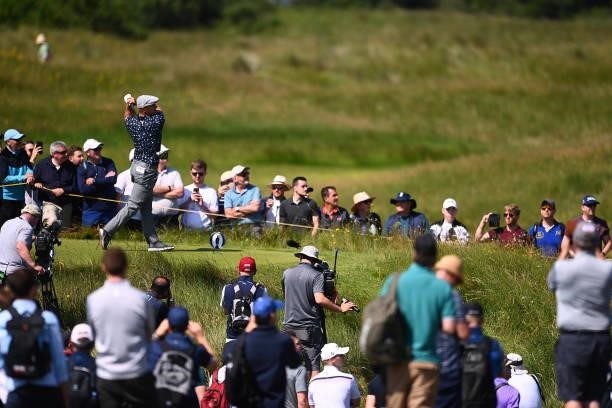 Bryson Dechambeau of The United States tees off on the 2nd hole during Day One of The 149th Open at Royal St George’s Golf Club on July 15, 2021 in...