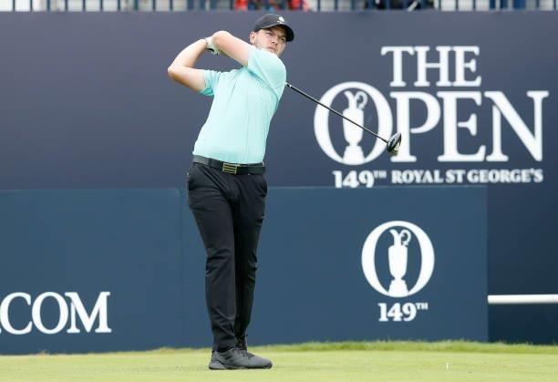 Amateur Sam Bairstow of England plays his shot from the first tee during Day One of The 149th Open at Royal St George’s Golf Club on July 15, 2021 in...