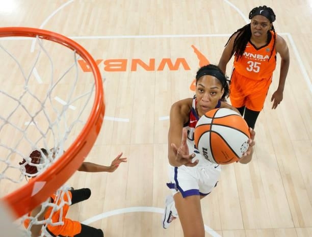 Ja Wilson of the USA Women's National Team shoots ahead of Jonquel Jones of Team WNBA during the 2021 WNBA All-Star Game at Michelob ULTRA Arena on...