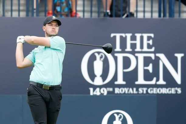 Amateur Sam Bairstow of England reacts after playing his shot from the first tee during Day One of The 149th Open at Royal St George’s Golf Club on...