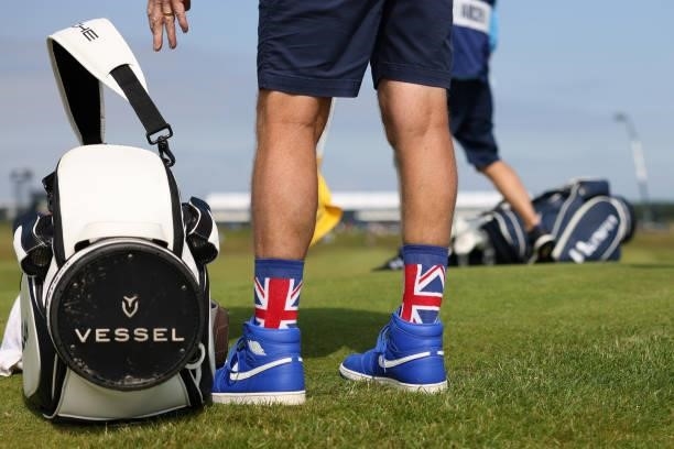 The Jordan 1 shoes and union jack socks of John Mclaren, Paul Casey's caddie, are seen during Day One of The 149th Open at Royal St George’s Golf...