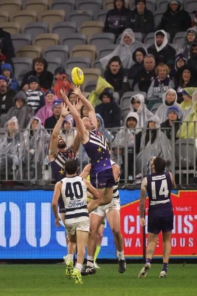Luke Ryan of the Dockers contests for a mark during the round 18 AFL match between the Fremantle Dockers and Geelong Cats at Optus Stadium on July...