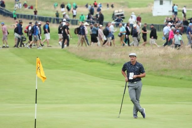 Bryson Dechambeau of The United States looks on on the 18th green during Day One of The 149th Open at Royal St George’s Golf Club on July 15, 2021 in...