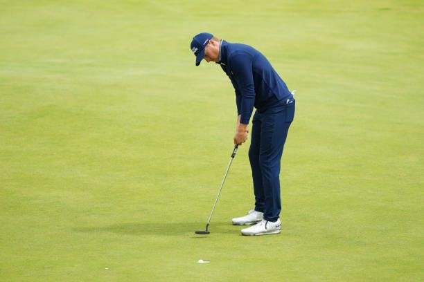 Jordan Spieth of the United States putts a shot on the green of the 18th hole during Day One of The 149th Open at Royal St George’s Golf Club on July...