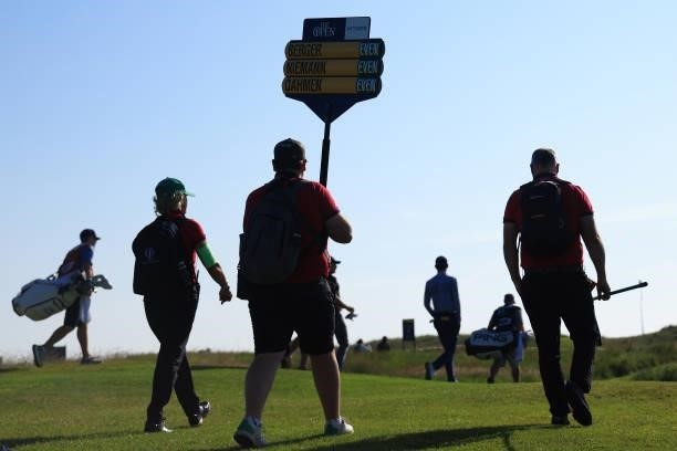Walking scoreboard carrier is seen during Day One of The 149th Open at Royal St George’s Golf Club on July 15, 2021 in Sandwich, England.