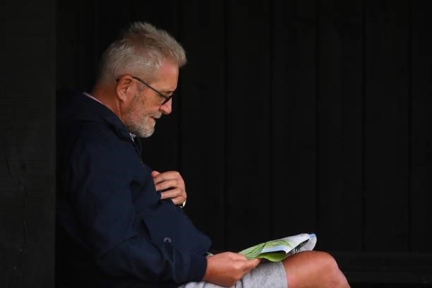 Spectator looks at a map during Day One of The 149th Open at Royal St George’s Golf Club on July 15, 2021 in Sandwich, England.