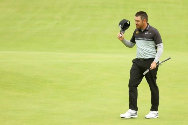 Louis Oosthuizen of South Africa reacts on the 18th hole during Day One of The 149th Open at Royal St George’s Golf Club on July 15, 2021 in...