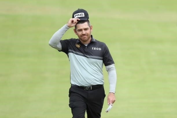 Louis Oosthuizen of South Africa acknowledges the crowd on the 18th green during Day One of The 149th Open at Royal St George’s Golf Club on July 15,...