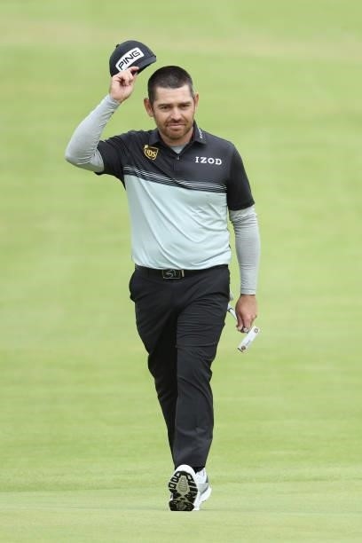 Louis Oosthuizen of South Africa acknowledges the crowd on the 18th green during Day One of The 149th Open at Royal St George’s Golf Club on July 15,...