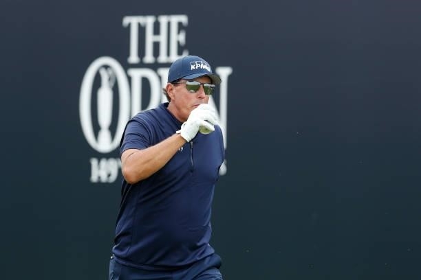 Phil Mickelson of the United States reacts as he prepares to tee off on the first hole during Day One of The 149th Open at Royal St George’s Golf...