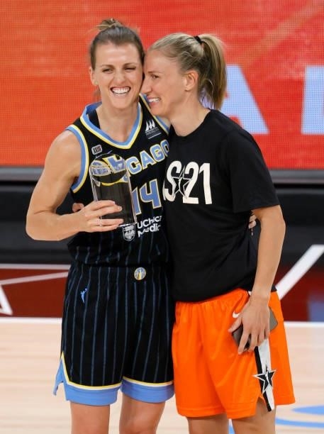 Allie Quigley of the Chicago Sky and her wife, Courtney Vandersloot of Team WNBA, pose with a trophy after Quigley won the 3-Point Contest during...