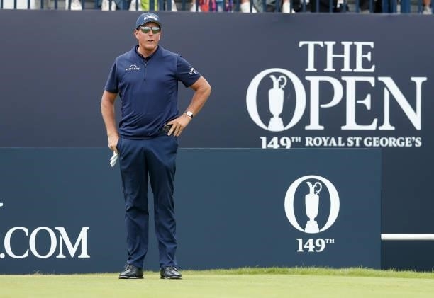 Phil Mickelson of the United States looks on as he prepares to tee off on the first hole during Day One of The 149th Open at Royal St George’s Golf...