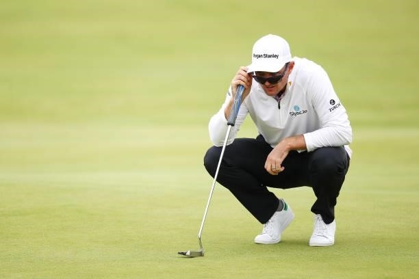 Justin Rose of England lines up a putt on the 18th hole during Day One of The 149th Open at Royal St George’s Golf Club on July 15, 2021 in Sandwich,...