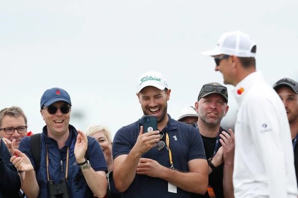 Fans applaud Justin Rose of England on the 18th hole during Day One of The 149th Open at Royal St George’s Golf Club on July 15, 2021 in Sandwich,...