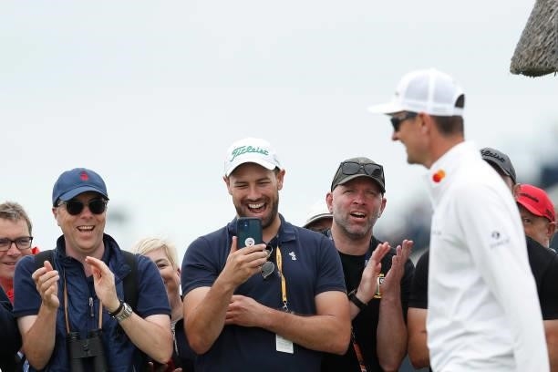 Fans applaud Justin Rose of England on the 18th hole during Day One of The 149th Open at Royal St George’s Golf Club on July 15, 2021 in Sandwich,...