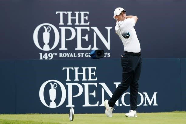 Rory McIlroy of Northern Ireland plays his shot from the first tee during Day One of The 149th Open at Royal St George’s Golf Club on July 15, 2021...