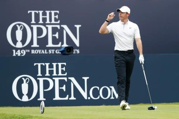 Rory McIlroy of Northern Ireland reacts before playing his shot from the first tee during Day One of The 149th Open at Royal St George’s Golf Club on...