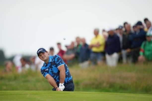 Patrick Reed of the United States plays a shot on the first hole during Day One of The 149th Open at Royal St George’s Golf Club on July 15, 2021 in...