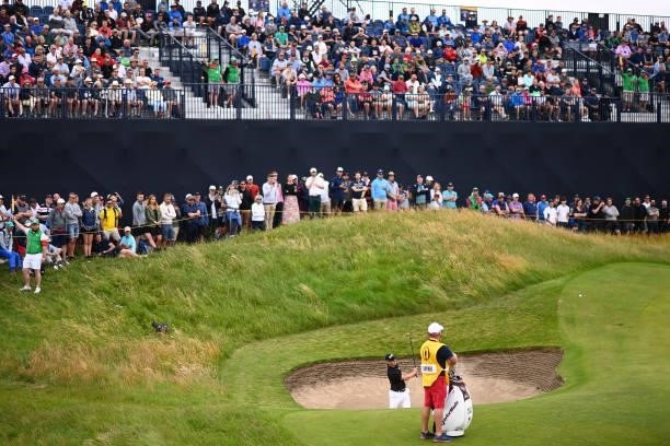 Martin Kaymer of Germany plays a shot out of the bunker on the 16th hole during Day One of The 149th Open at Royal St George’s Golf Club on July 15,...