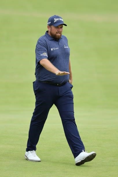 Shane Lowry of Ireland acknowledges the crowd on the 18th green during Day One of The 149th Open at Royal St George’s Golf Club on July 15, 2021 in...