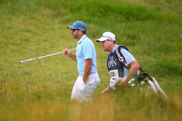 Sergio Garcia of Spain and caddie look on on the 16th hole during Day One of The 149th Open at Royal St George’s Golf Club on July 15, 2021 in...