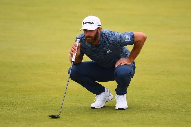 Dustin Johnson of The United States putts on the 16th green during Day One of The 149th Open at Royal St George’s Golf Club on July 15, 2021 in...