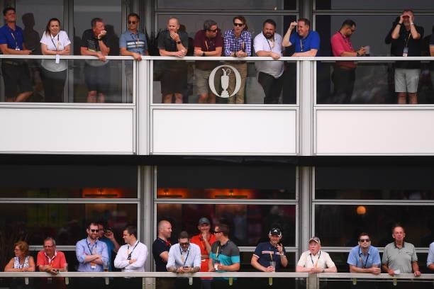 Spectators look on from the 16th green hospitality suites during Day One of The 149th Open at Royal St George’s Golf Club on July 15, 2021 in...