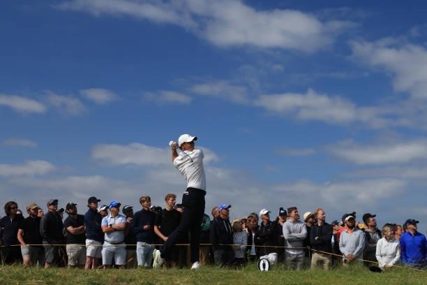 Rory McIlroy of Northern Ireland tees off on the 3rd hole during Day One of The 149th Open at Royal St George’s Golf Club on July 15, 2021 in...