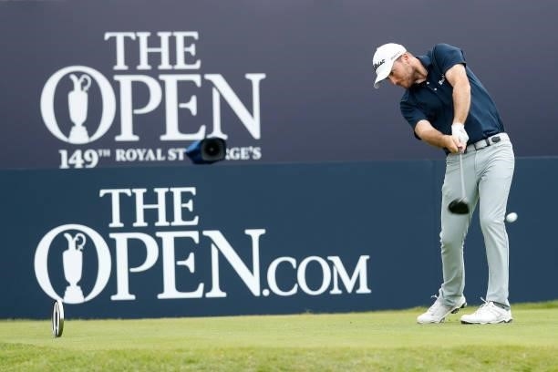 Russell Henley of the United States hits his shot on the first tee during Day One of The 149th Open at Royal St George’s Golf Club on July 15, 2021...