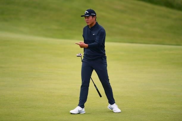 Yuxin Lin of China reacts on the 16th green during Day One of The 149th Open at Royal St George’s Golf Club on July 15, 2021 in Sandwich, England.