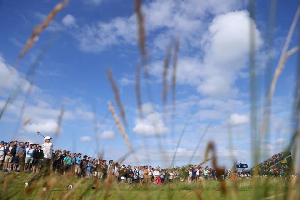 Rory McIlroy of Northern Ireland tees off on the 4th hole during Day One of The 149th Open at Royal St George’s Golf Club on July 15, 2021 in...
