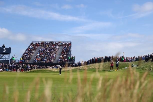 Rory McIlroy of Northern Ireland putts on the 3rd green during Day One of The 149th Open at Royal St George’s Golf Club on July 15, 2021 in Sandwich,...