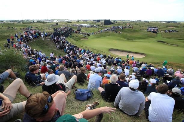 Fans watch play on the sixth green during Day One of The 149th Open at Royal St George’s Golf Club on July 15, 2021 in Sandwich, England.
