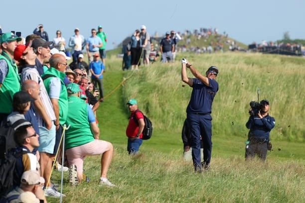 Phil Mickelson of the United States plays his second shot on the ninth hole during Day One of The 149th Open at Royal St George’s Golf Club on July...