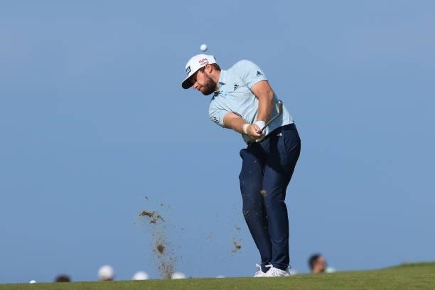 Tyrrell Hatton of England plays his second shot on the 8th hole during Day One of The 149th Open at Royal St George’s Golf Club on July 15, 2021 in...